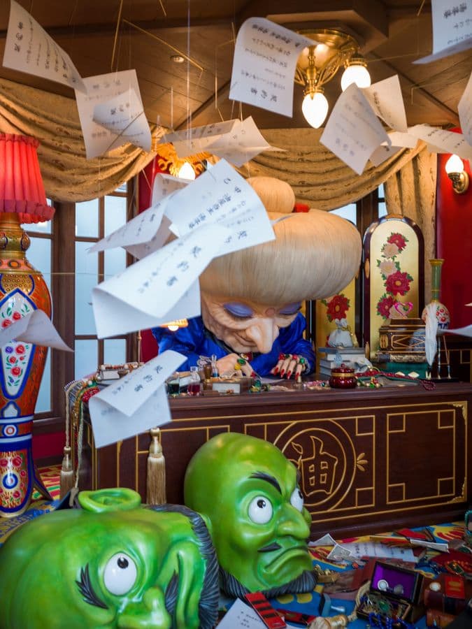 Fortune Slips Dance Above Chinese Folk Deities