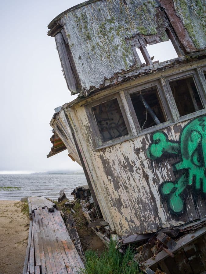 Wooden Vessel Decays Where Sea Meets Sand